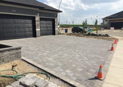 Paving stones in front of garage