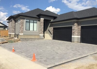 Paving stones in front of garage